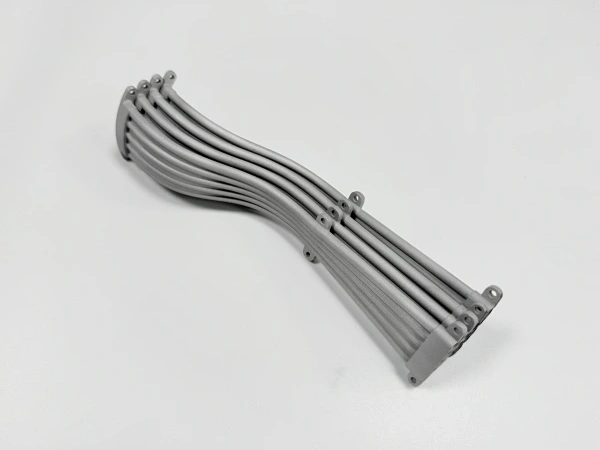 bolt hole and datum pad machining on titanium AM bracket